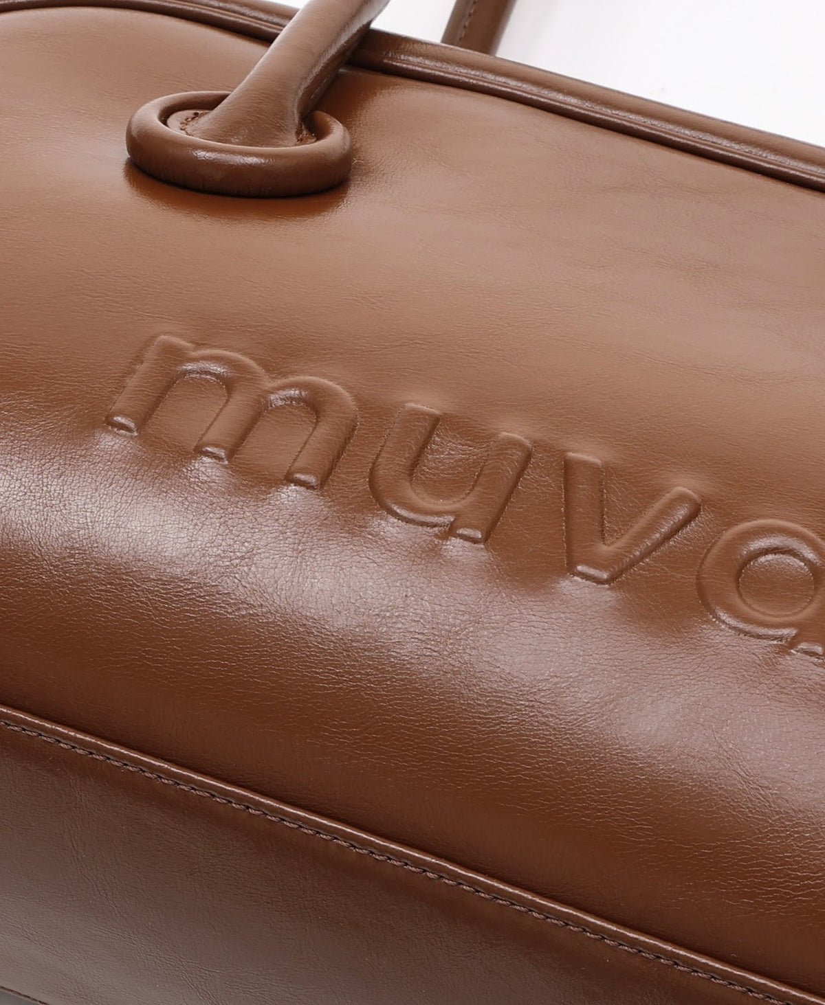 Model carrying the BoBo Shoulder Bag in Caramel Brown