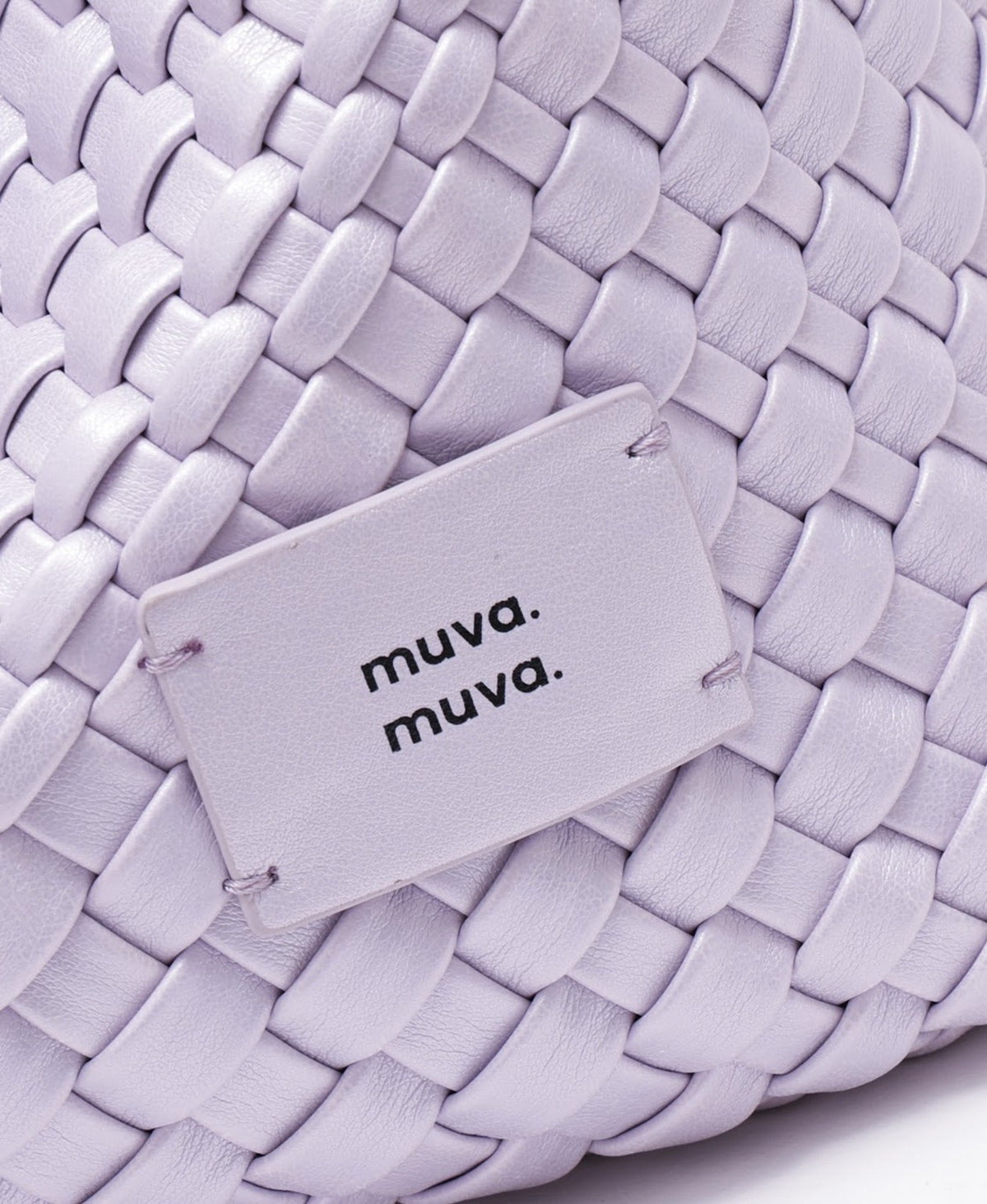 Model carrying the ZhuZhu Woven Shoulder Bag · Pearl in Pearl Purple
