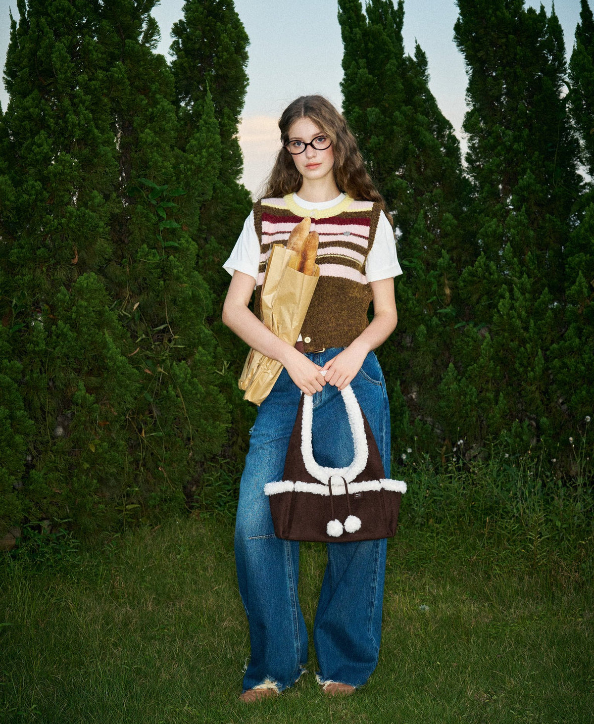 Model carrying the Fluffy Cloud Bag