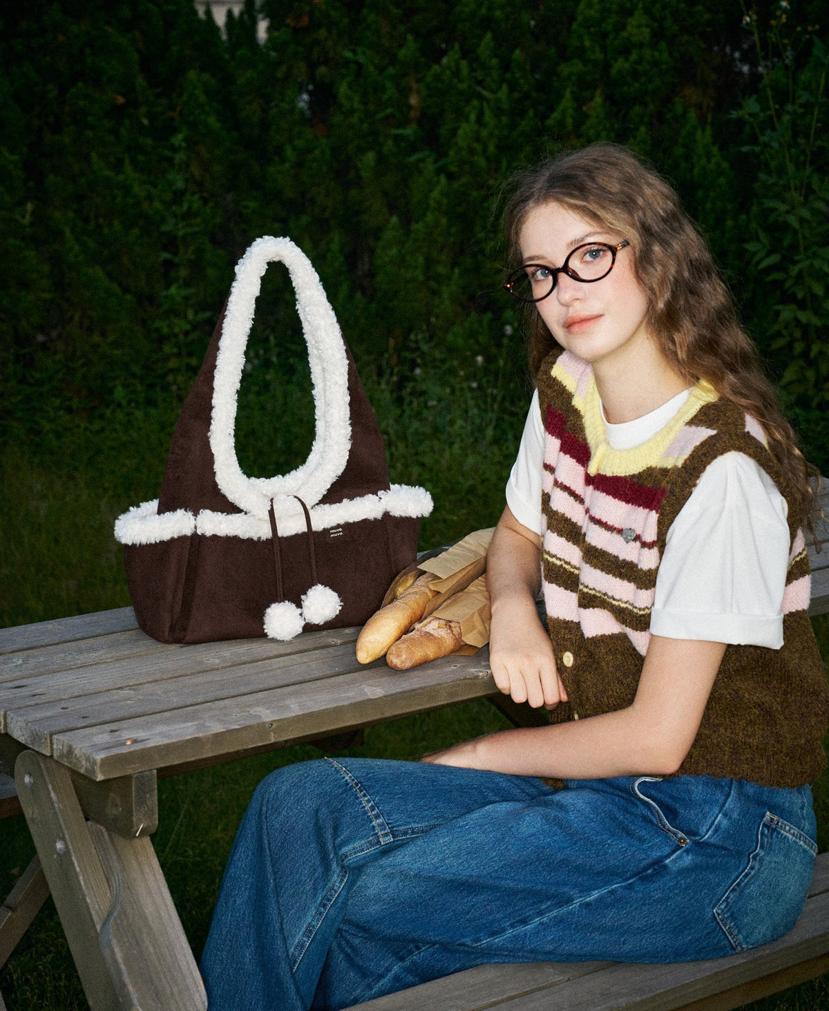 Model carrying the Fluffy Cloud Bag