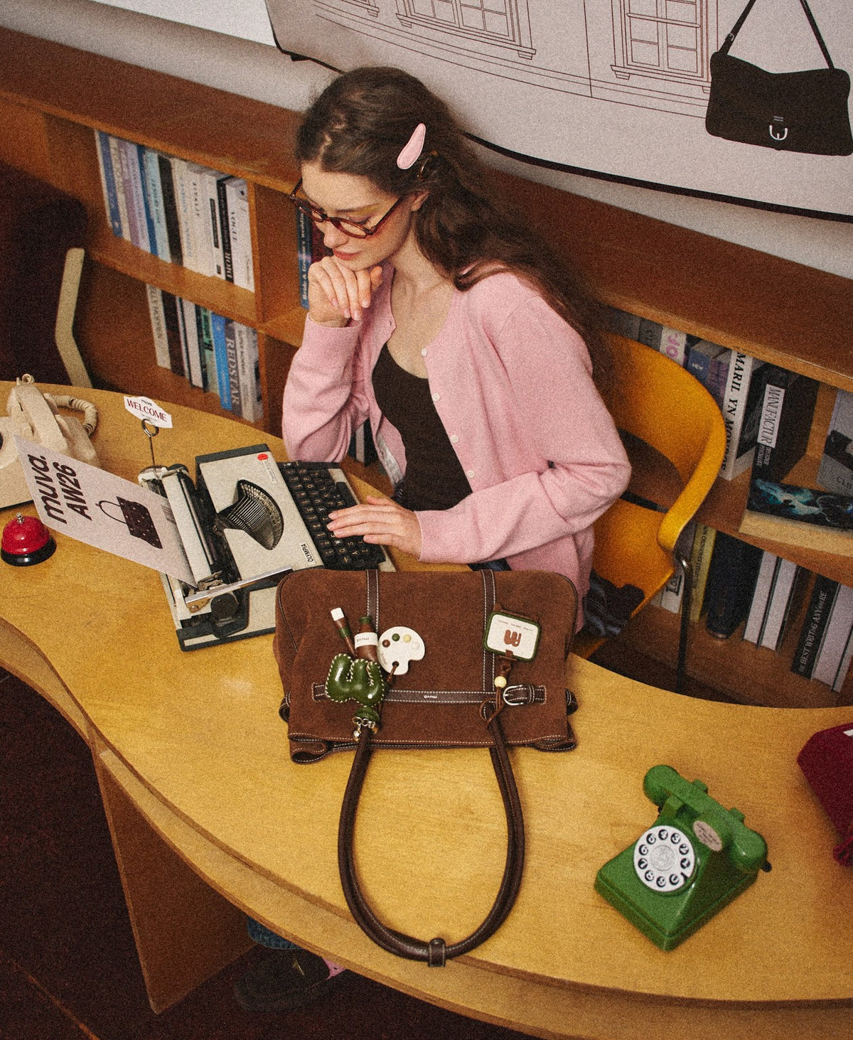 Model carrying the Hopscotch Tales Garden Tote Bag · Suede in Caramel Brown