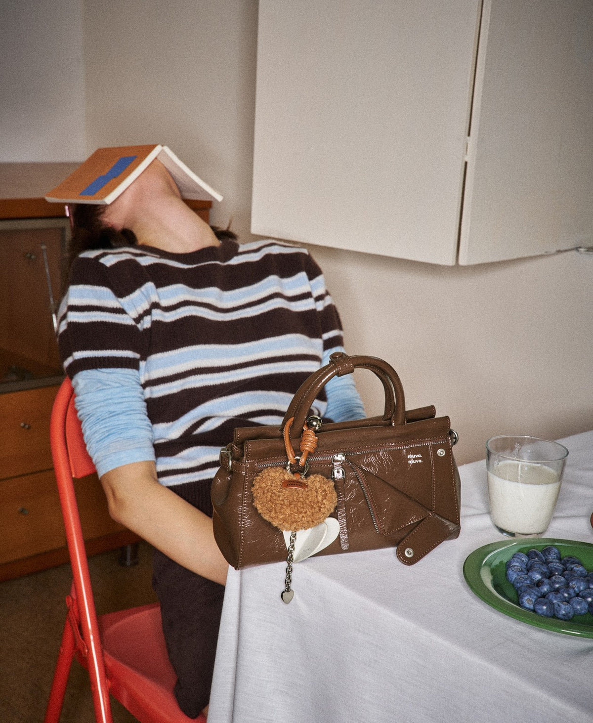 Model carrying the Free Spirit Flap Bag in Caramel Brown