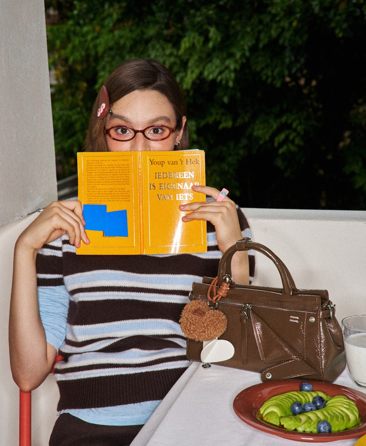 Model carrying the Sweet Cool Free Spirit Flap Bag in Caramel Brown