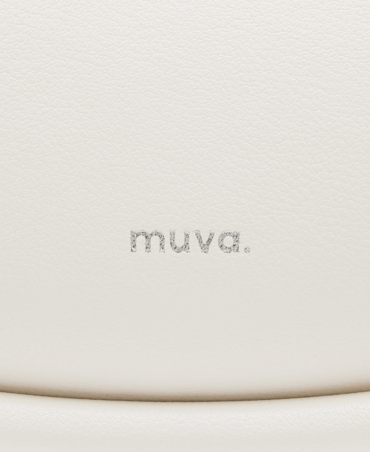 Model carrying the Companion Sway Shoulder Bag in Milkshake White
