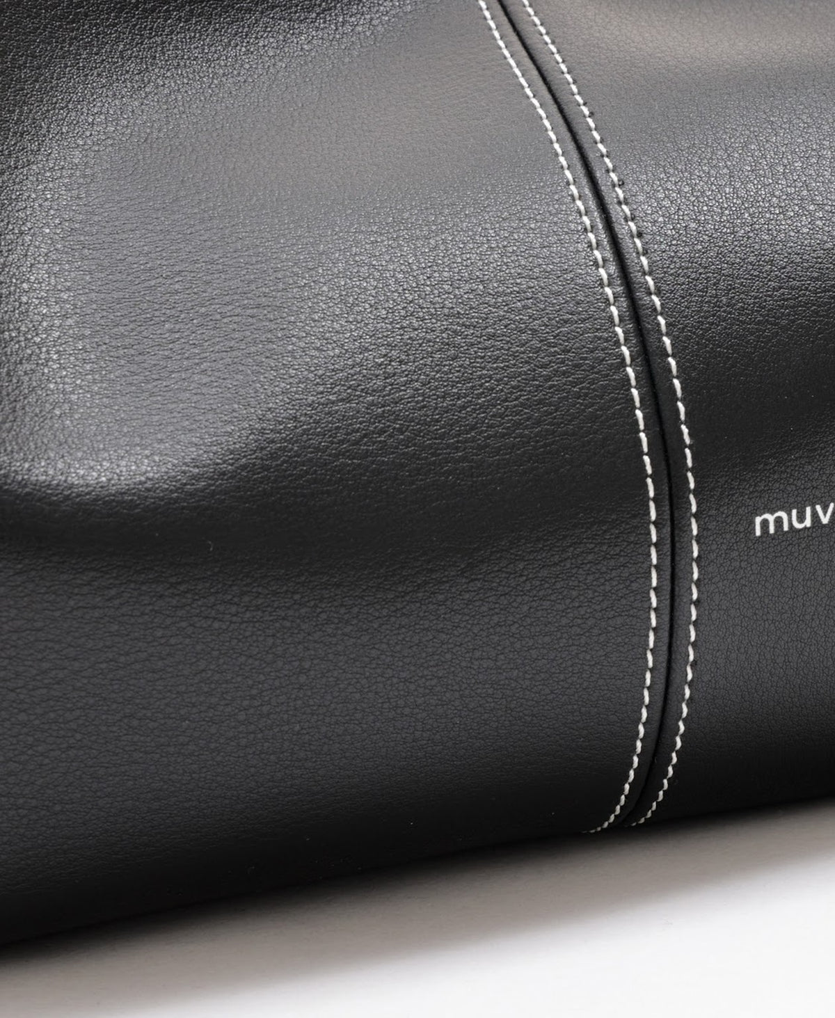 Model carrying the Half Moon Bag in Black