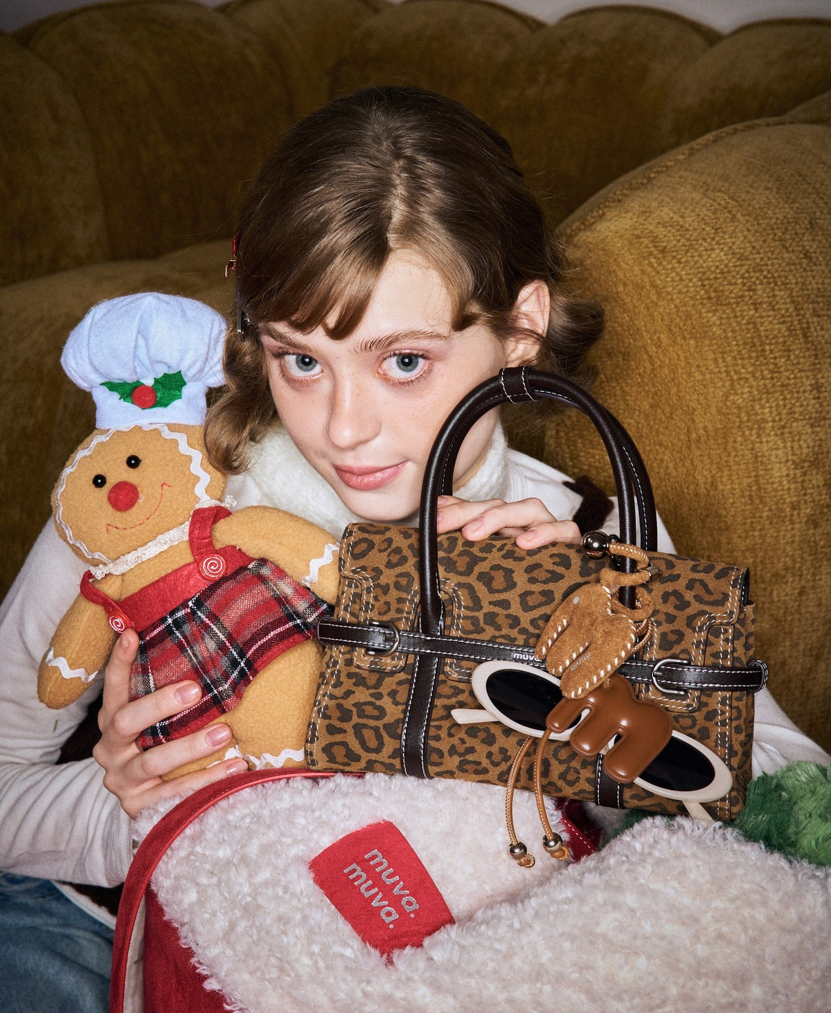 Model carrying the Hopscotch Tales Hopscotch Bag · Animal Print in Tortoiseshell Brown