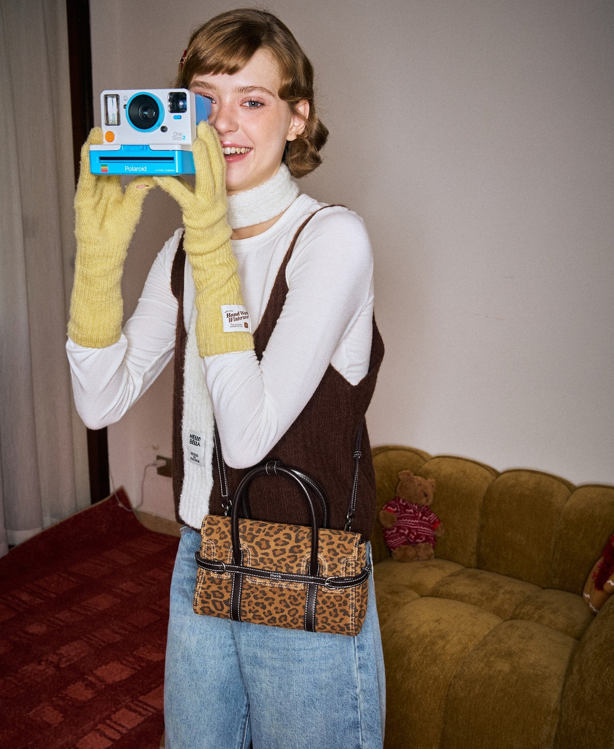 Model carrying the Hopscotch Tales Hopscotch Bag · Animal Print in Tortoiseshell Brown