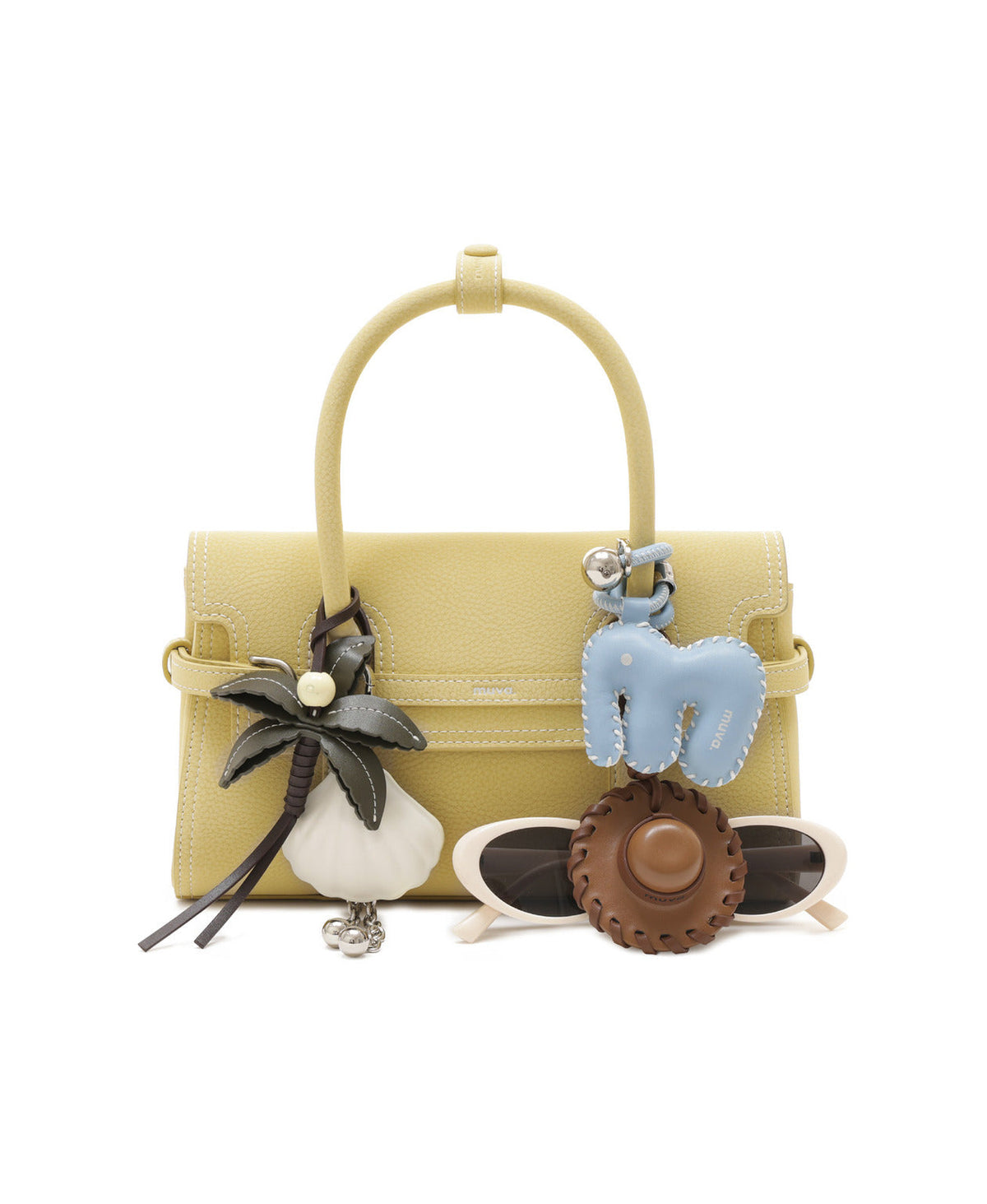 Coconut Tree Charm (Coconut Tree) styled on Hopscotch Tales Hopscotch Bag · Leather · Creamy Yellow