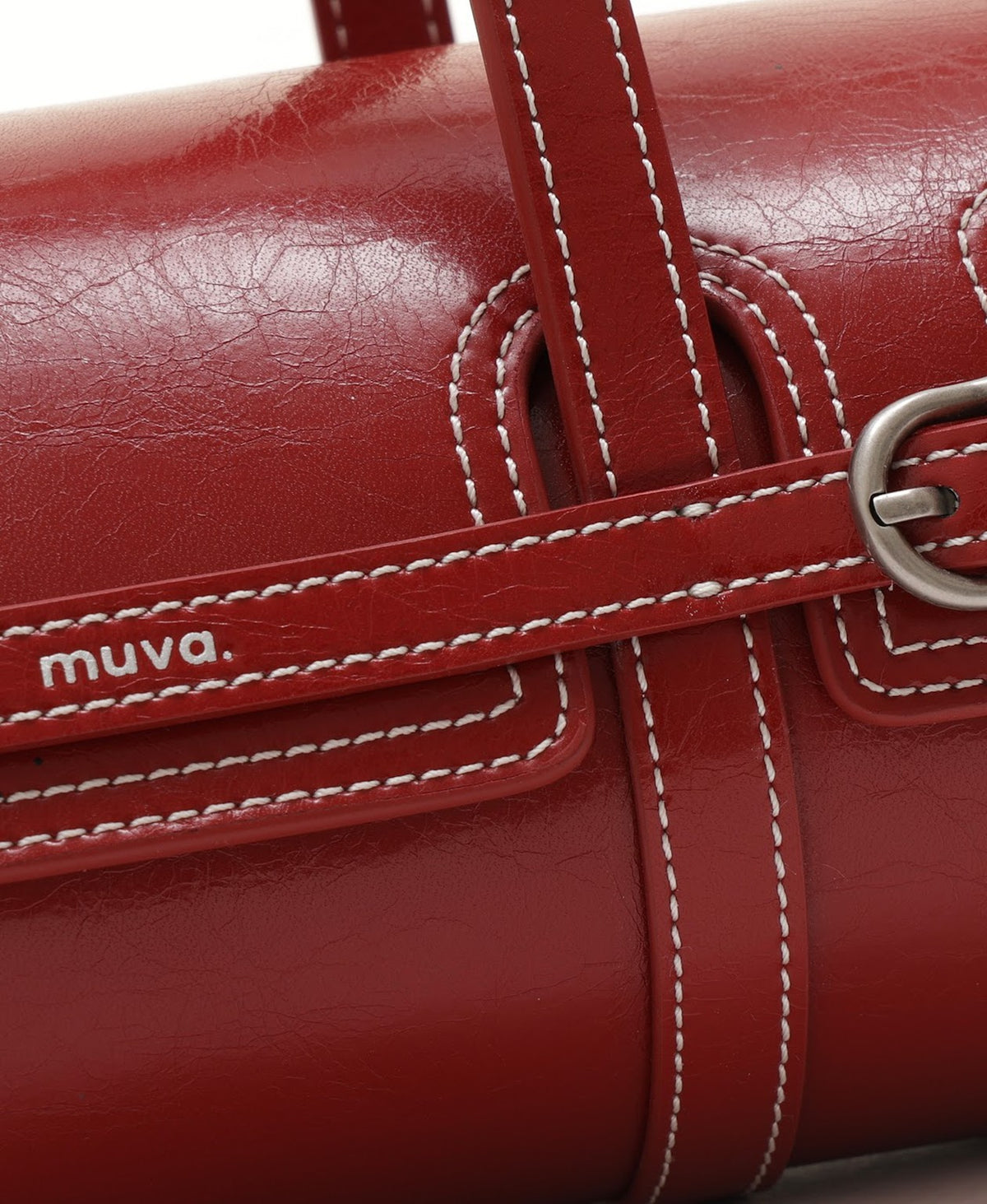 Model carrying the Hopscotch Tales Hopscotch Cylinder Bag in Red