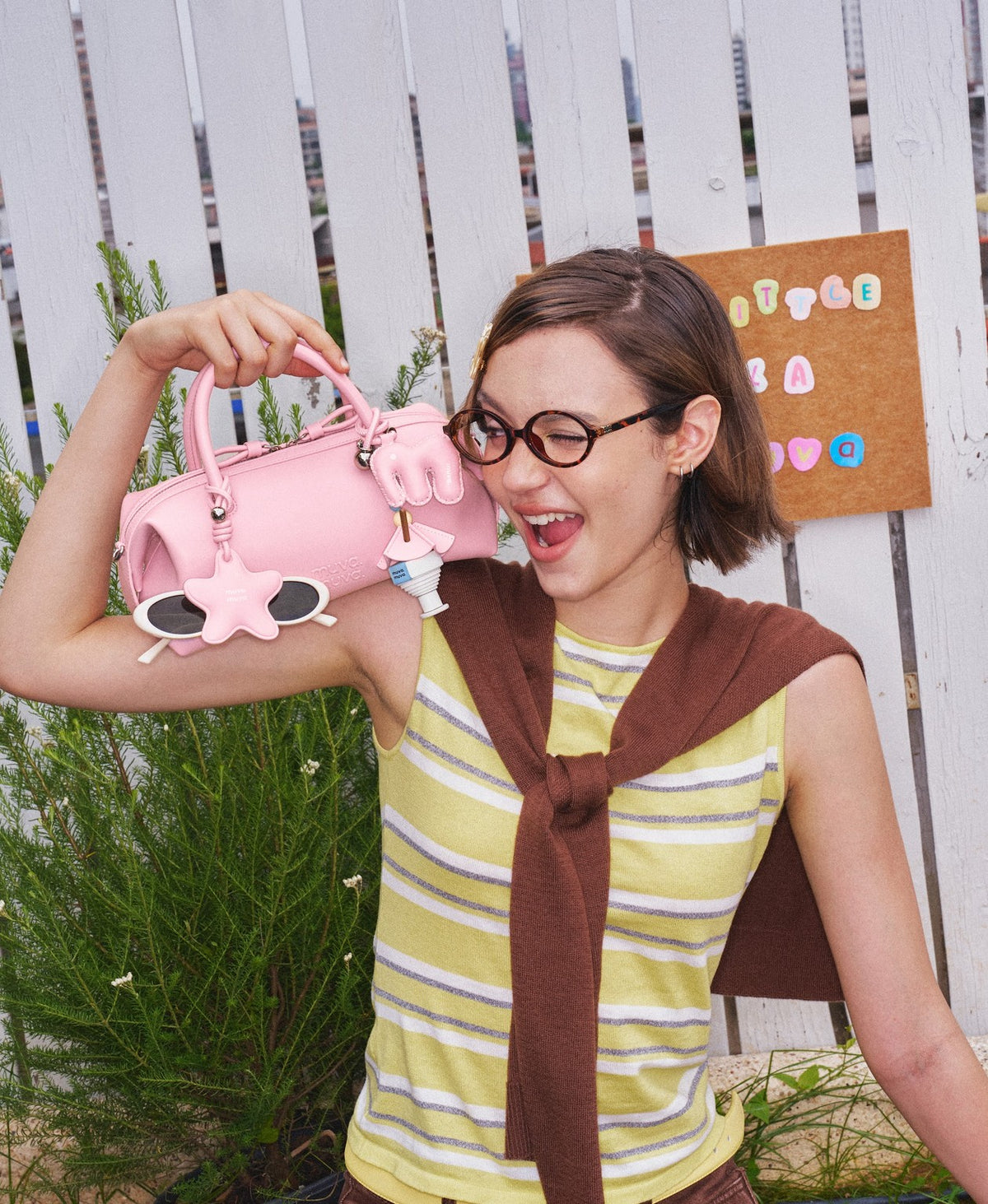 Model carrying the Bakery Bubble Bag in Cherry Blossom Pink