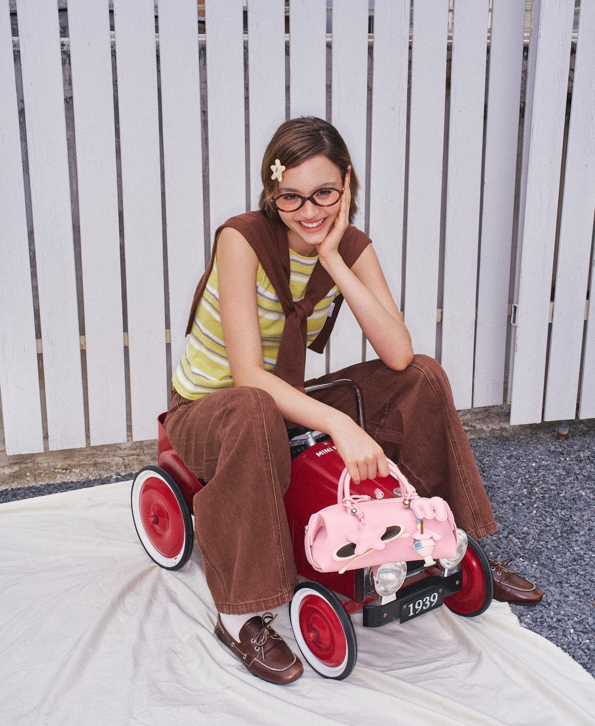 Model carrying the Bakery Bubble Bag in Cherry Blossom Pink