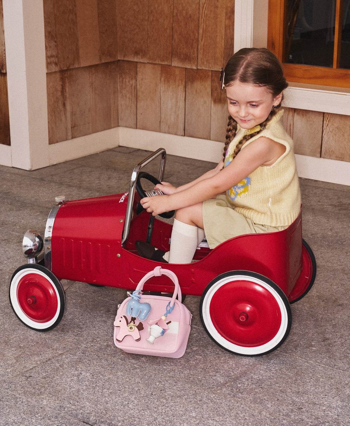 Model carrying the Puzzle Tofu Bag in Soft Pink