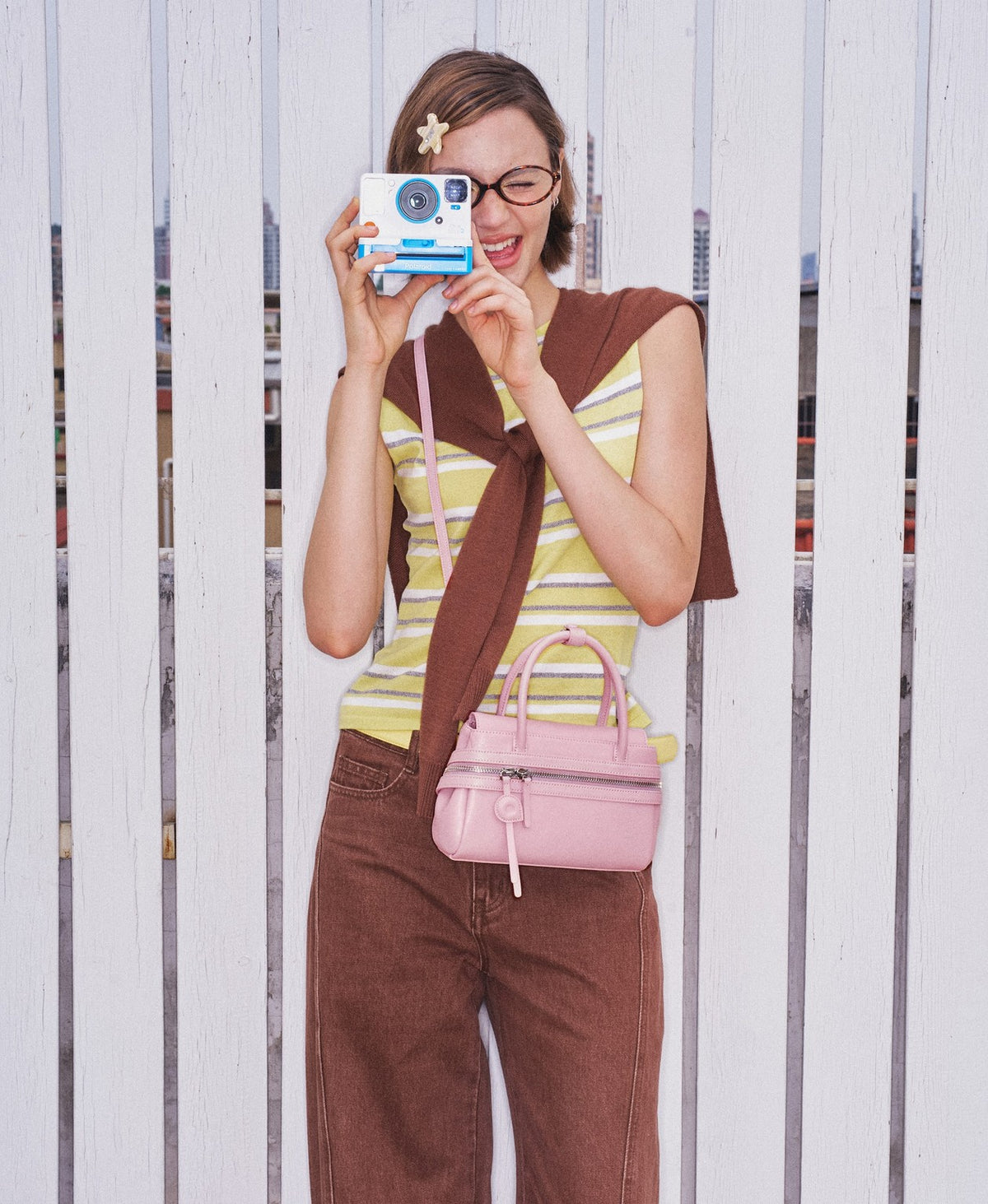 Model carrying the Lala Soda Bag in Cherry Blossom Pink