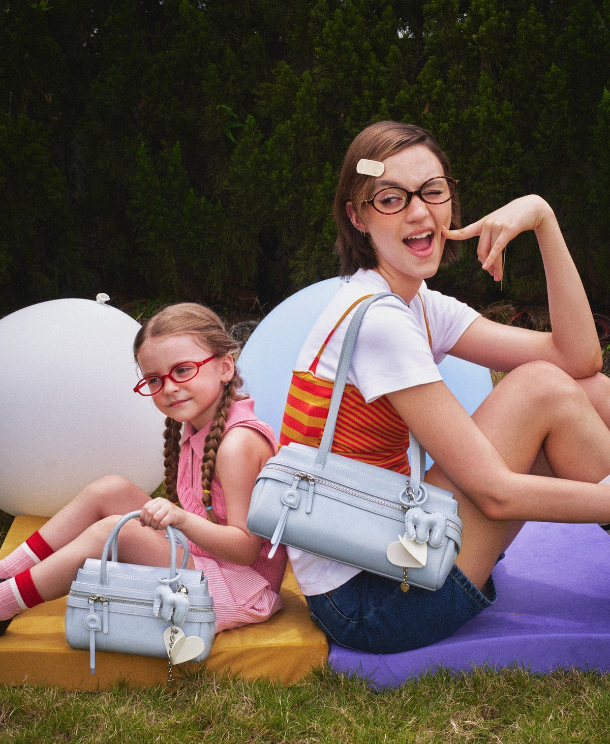 Model carrying the Lala Soda Bag in Sky Blue