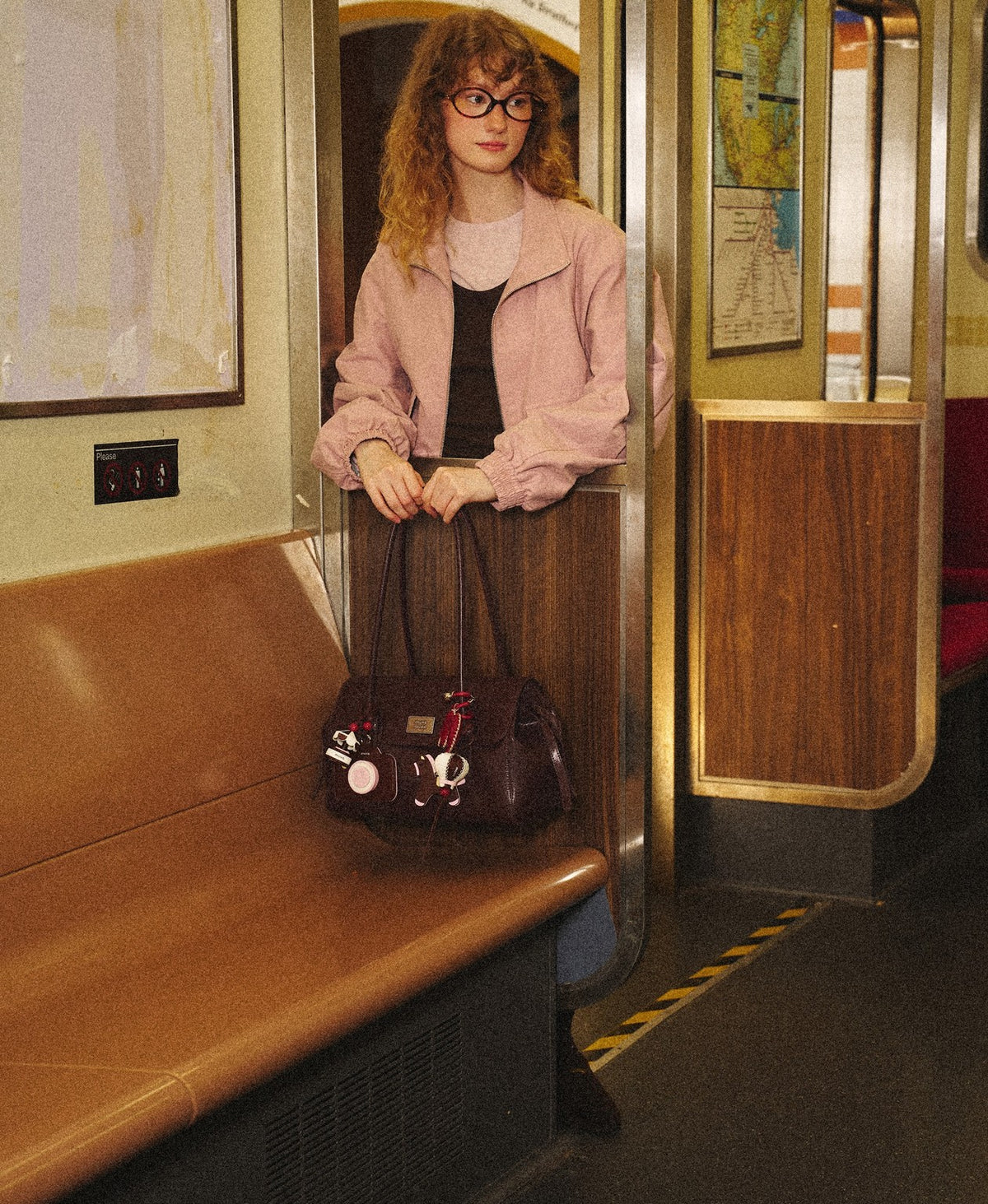 Model carrying the Treasure Bag in Chocolate Brown