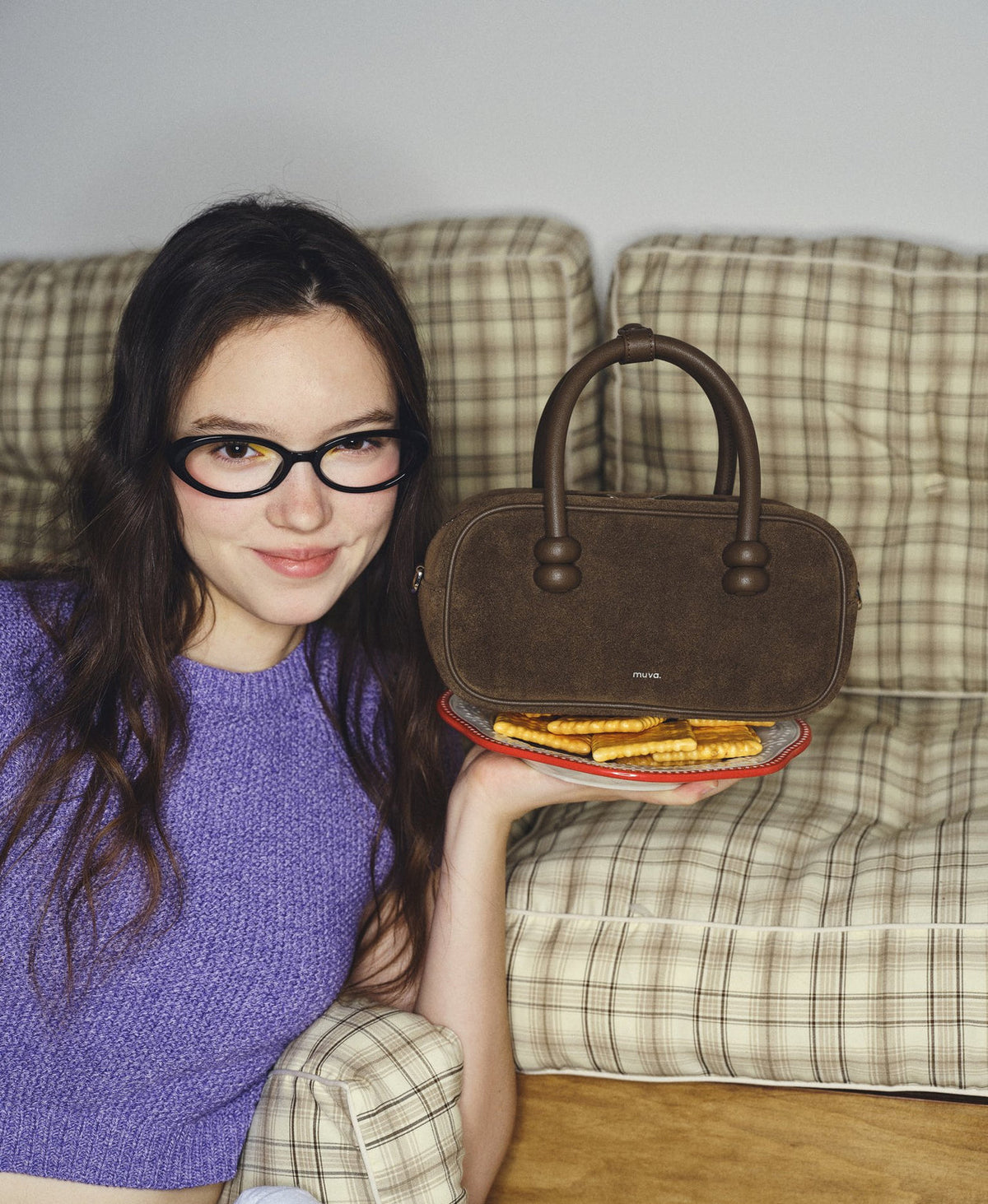 Model carrying the ZhuZhu Boston Suede Handbag