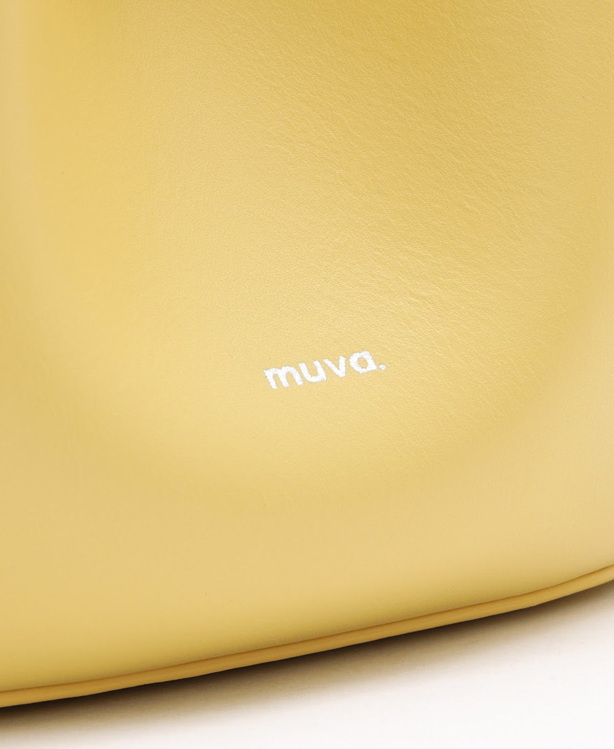 Model carrying the Flower Bud Bag in Creamy Yellow