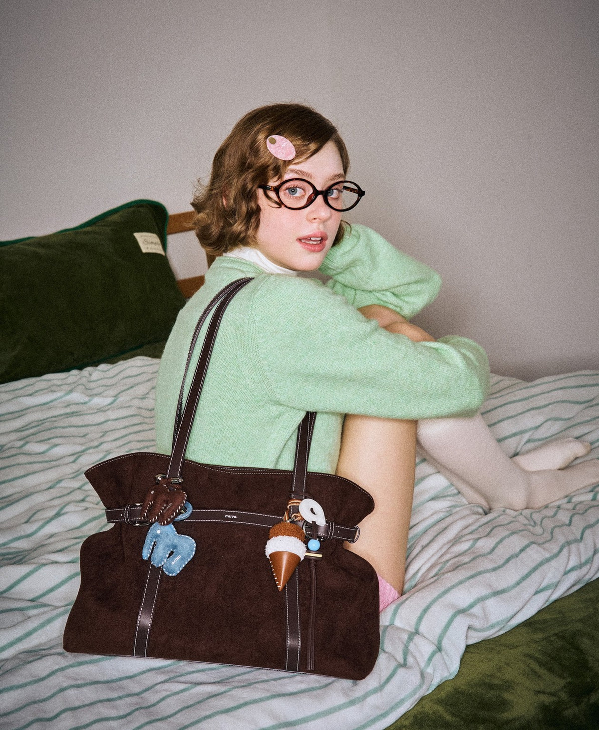 Model carrying the Siu Mai Tote Bag in Chocolate Brown