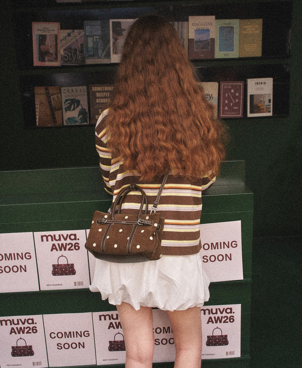Model carrying the Hopscotch Tales Garden Bag · Polka Dot in Chestnut Bobo