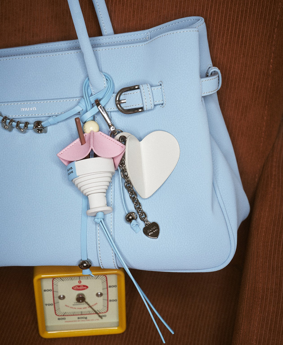Summer Cocktail Charm styled on a bag